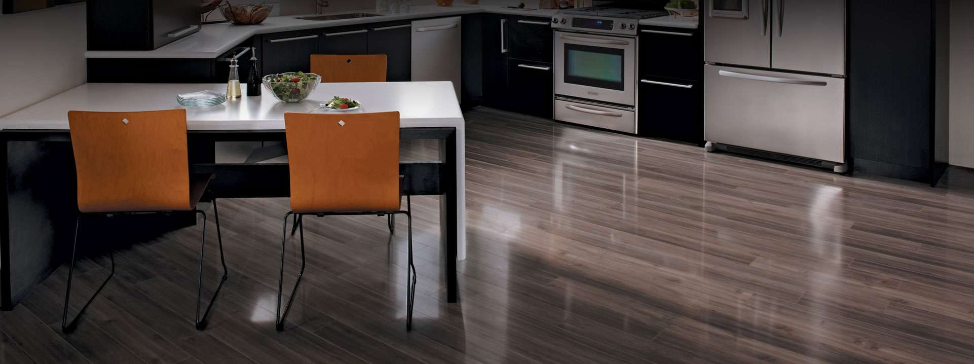 Glossy hardwood floor in a modern Austin kitchen